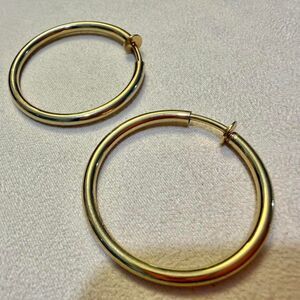 Gold tone hoop earrings, approximately